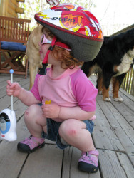 Helmet, radio and skinned knees