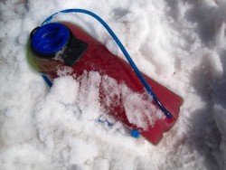 chilling in the snow, full of melted snow (and Gu drink mix).