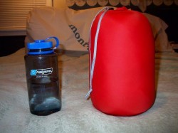stuff sack included....next to a 1L Nalagene, a compression sack will make this much smaller...