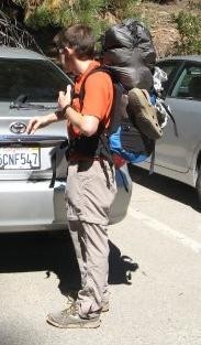 John - as long as if this isn't packed to the max, you can bring this on the plane as a carry on. I own this pack and its a great pack for what you are looking for. If I had to make some recommendations to you for your fear of it getting lost, remember you're allowed two carry on bags. If you have this bag packed close to it's capacity, I'd take half of the stuff in the pack, and put it in another bag and stuff it under the seat in front of you. I used this strategy when I flew to California for a 3 night trip in Sequoia... I mailed my fuel canisters, knives, tent stakes, lighters, etc. If you are super organized, I've seen people mail their entire backpacks packed with supplies (other than perishable food). <br/>  <br/> I've attached a pic of this pack completely packed to the brim... I couldn't fit another ounce of gear in there. I am 5'4" so if this bag looks big, it's because I am smaller than the average joe. <br/>  <br/> Last but not least, you could not check this at the airport front desk, go through security, and then check it at the gate. I've had great luck with that... saves you the baggage fee and most of the time you can pick up the bag as soon as you de-plane. At least you know that it made it on your flight safely.