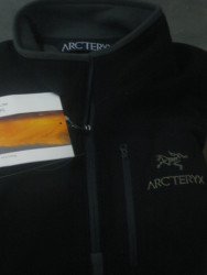 The trim on the black variant is a dark grey, not black as it might appear in the photo