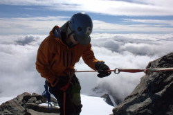 Rapping off the Mt. Shuksan summit pyramid with the goat