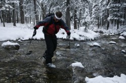 Agent AT, crossing a Mission Creek in the Beartooths