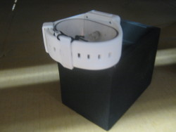 The buckle matches the band/watch color