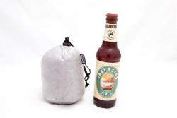 Size medium Women's Down Shirt packed into it's stuff sack