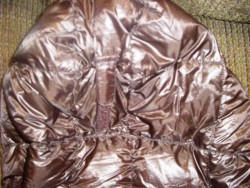 The velcro tab rear hood adjuster