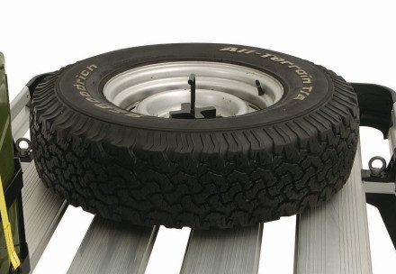 Check out the Rhino-Rack Alloy Tray on the site as you can place spare tires, gas tanks, propane tanks, highlift jack, shovels on the tray with the right accessories!