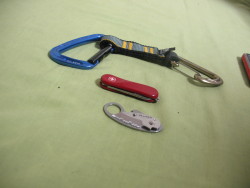 Trango next to a basic swiss army knife.