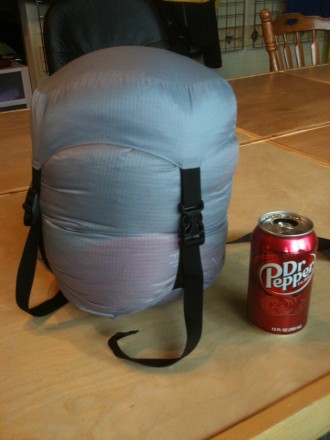 Image of Stoic Somnus 15 in compression sack vs 12oz can