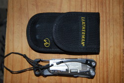 Skeletool with can opener and sheath