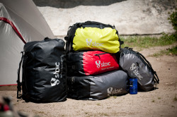 Demonstrating M, L, and XL Duffel Sizes