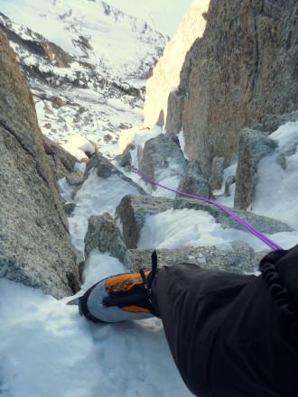 Sabertooth fits but the fit could be better,  The Ultra below is a Sabertooth with a Petzl front bail.  Much better fit than the BD front bail on the Scarpa Phantom Series of boots.  Petzl crampons are a better match up out of the box.
