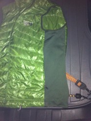 Stretch side panel and handwarmer pocket.