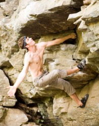 Travis wearing Evolv Defy shoes