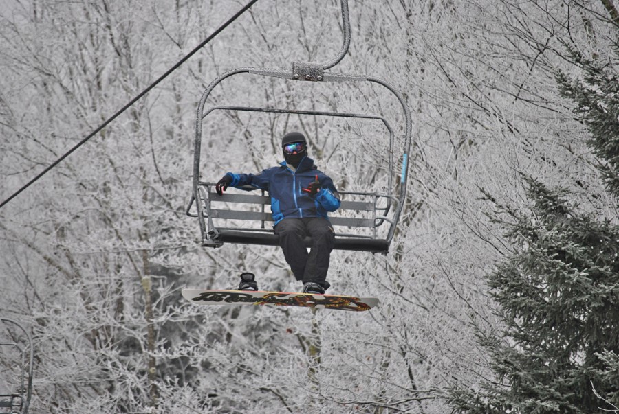 It's great for snowboarding. I've had mine and used it for exactly that purpose for about  4 years now. This is the original SV version, but it works so well I can't justify upgrading just because of the color.  As in my original review, my only problem is that you almost have to have the jacket completely zipped up or the larger side of the collar will slap the heck out of your face! 