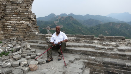 I am 6'1" and 250 lbs .  I wear a XXL in this that worked well for me as we hiked all over China last summer - careful not too over-stress the zippers though..