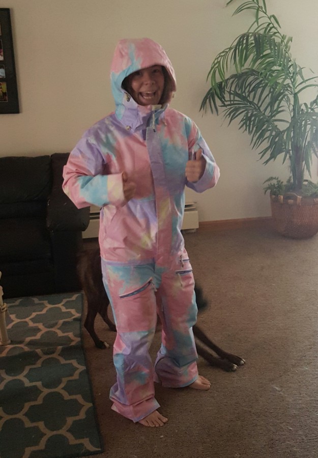 Hi Amanda, 
this is a tough one because they're are some mixed reviews. I am 5'4 and weight  140lbs. I purchased a medium. I like my gear to be just a bit baggie on me.  I would of never been able to wear the small because every time i bend over it gives me a wedgie. The Onsies always looks bigger than they are, until you put it on.

Here I am looking like a fool, but extremely excited in a medium. 


  
