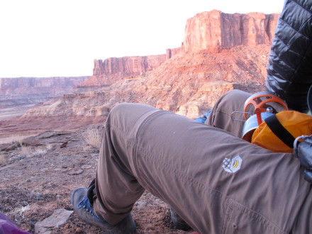 I know what you mean... I have a pair of Columbia Titanium Silver Ridge II pants that has that thin "nylon" feel.  MH's Mesa Pants are made of "Canyon Twill" (100% nylon) and have a more textured feel.  As mentioned above, these pants have a "Micro-Chamois" lining (100% brushed polyester) but only inside of the waistband.  I mostly wear my Mesa Pants on September alpine trips (daytime temps in the 40's/50's, nighttime temps in the 20's/30's) and they have never felt too light.  I also wore them in Utah's Canyonlands N.P. this March (warm, sunny, dry, dusty) and they weren't too warm either (see pic below).  Hope this helps!