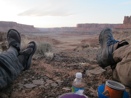 These boots are killer and they will keep your feet dry - they have "GORE-TEX gasket construction" and "waterproof top grain leather uppers".  I pack thru snow-melt, cross streams and follow wet trails and my feet have always stayed dry.  I've done a couple 50-mile September, alpine trips (mid-40 deg temps in the day / mid-20 deg temps at night) and cold feet were never a problem.  See my review, below, for more info on this boot.