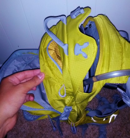 Small top pocket and hydration sleeve
