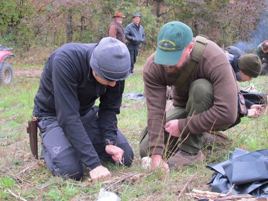 kneeling on the ground